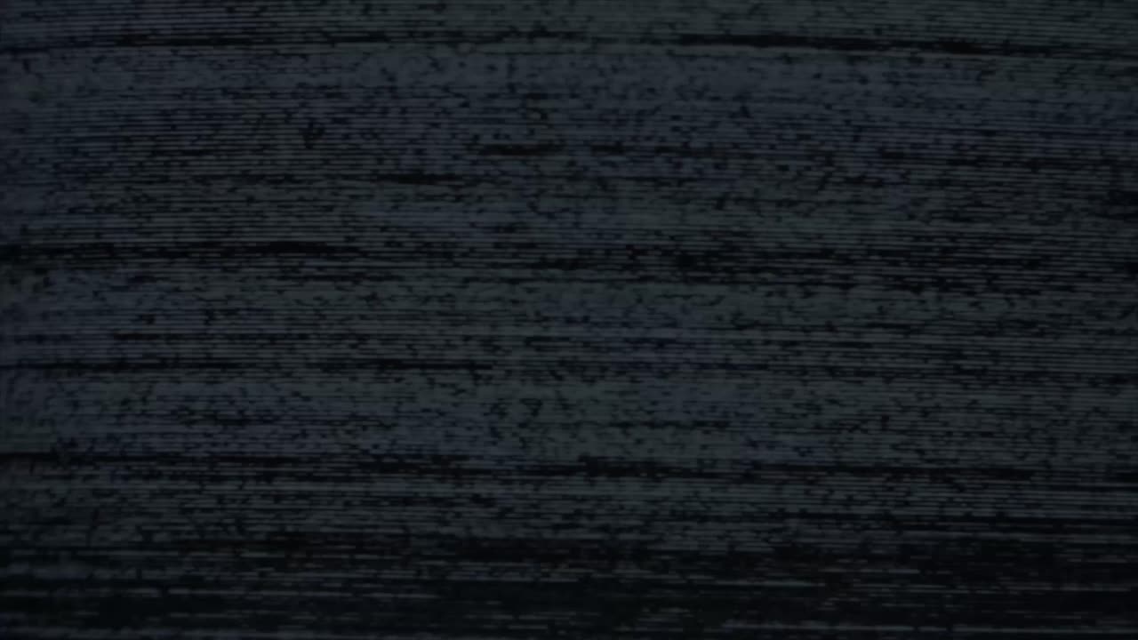 Authentic VHS tape noise with color bleeding, scan lines, and static glitch effects. Seamless loop for creating a retro 80s or 90s television look. Use as an overlay or background