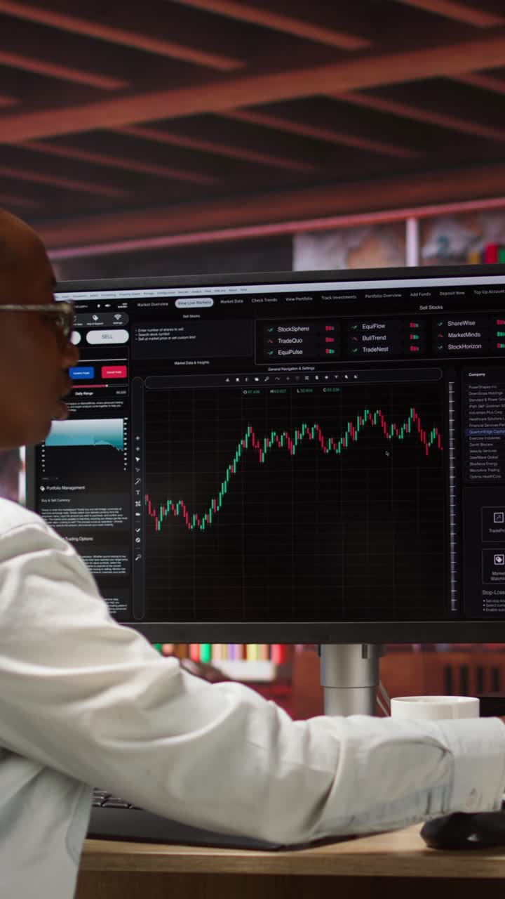 Vertical video Day trader using PC to sell stocks, aiming to capitalize on market trends