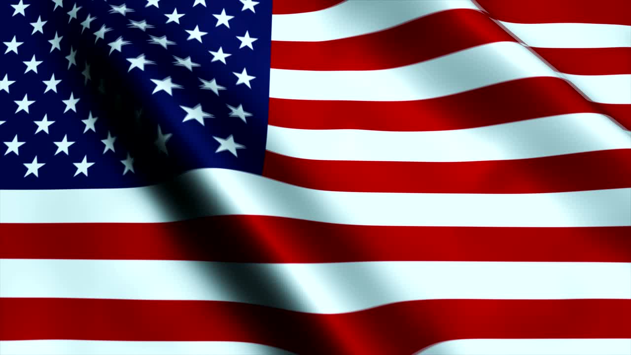 la bandera de los estados unidos ondeando en el viento.