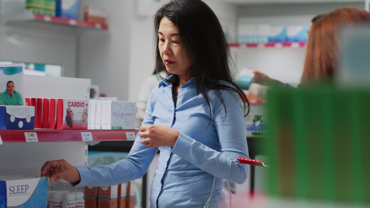Woman shopping for sleep aid in pharmacy