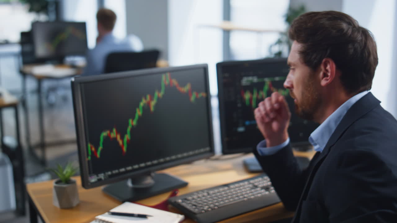 Financial analyst working investment office space analyzing fund market closeup