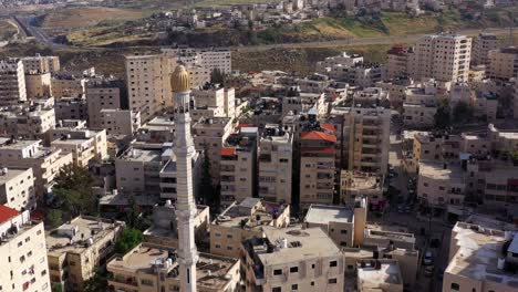 mosque tower minaret in shuafat refugee camp, jerusalem-aerial view