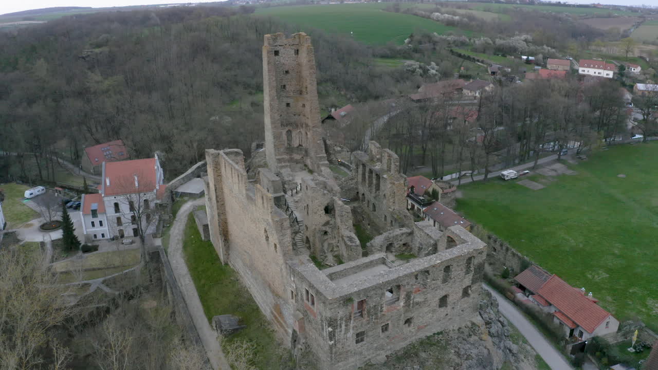 Ruins of the medieval castle of Okoř overlooking Czech countryside