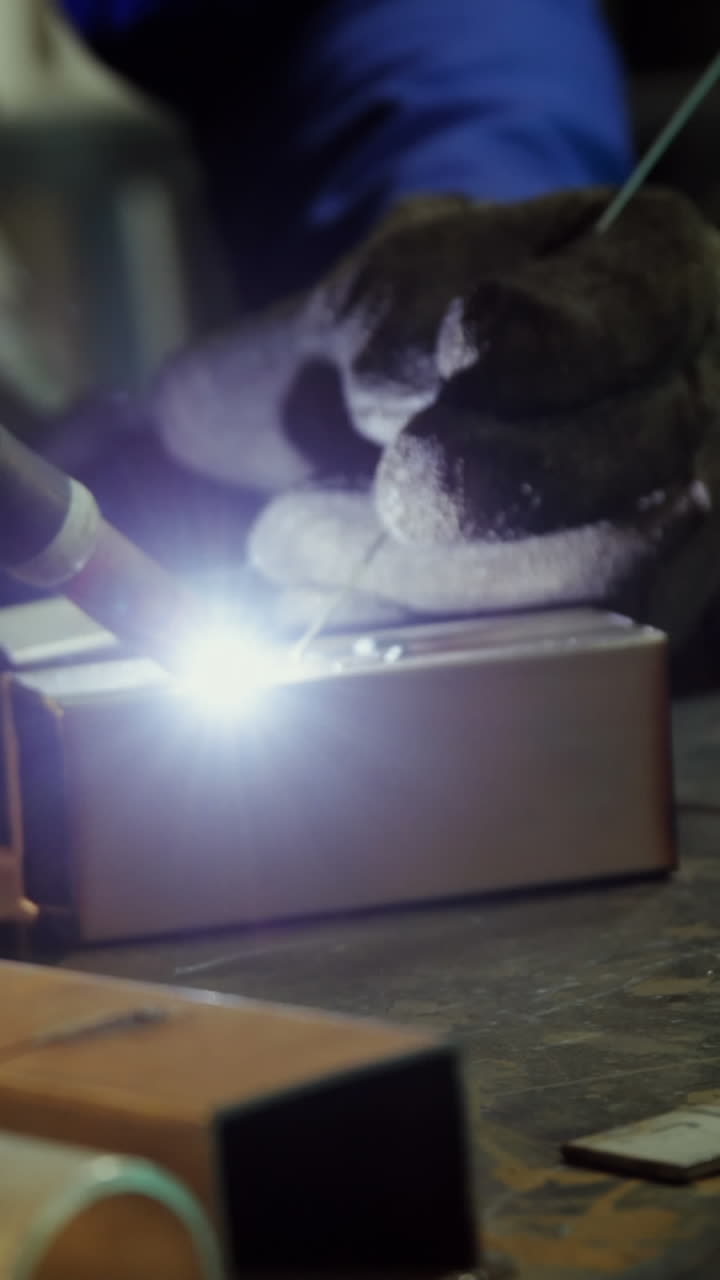 Male welder working on a piece of metal