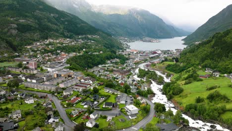aerial view of a charming town nestled in a norwegian fjord valley