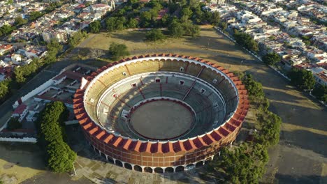 drone orbits above plaza de toros nuevo progreso in guadalajara, jalisco, mexico