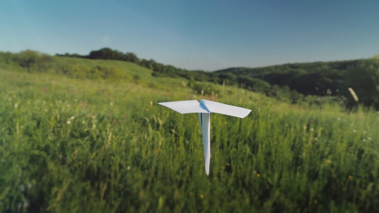 A Real Paper Airplane Is Flying Over A Picturesque Valley Pov Video