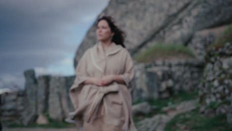 spiritual-woman-walks-towards-the-camera-and-looks-at-the-horizon-slow-motion