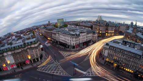 london city street at night with time-lapse traffic