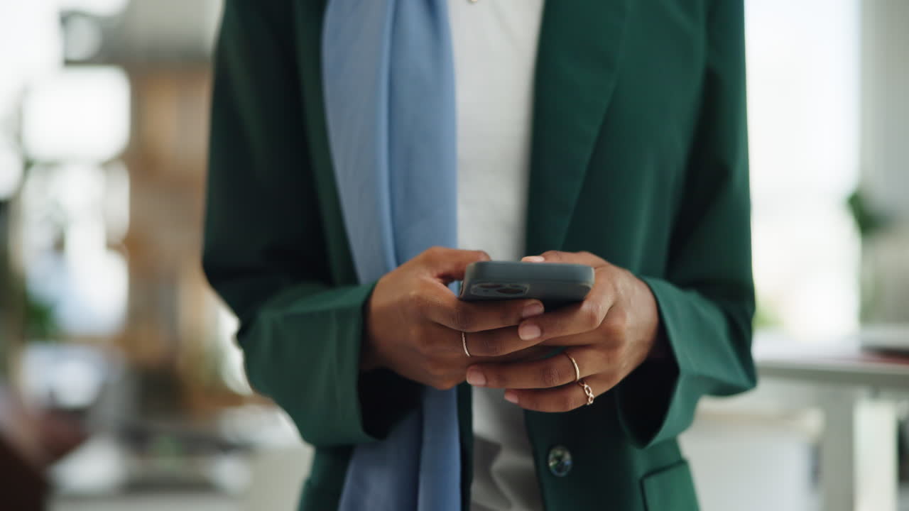 Close Up of Hands Typing on Smartphone