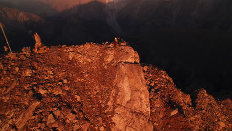 Aerial-View-of-Tourists-on-Testa-Di-Liconi-Mountain-Peak-and-Mont-Blanc-Mountain-in-Horizon,-Italian-Alps-Landscape