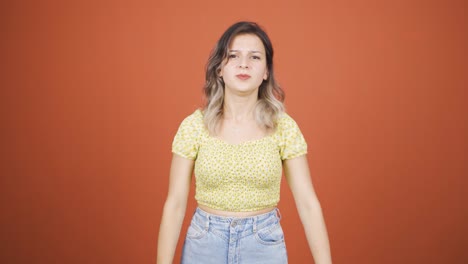 Young-woman-getting-angry-at-camera.