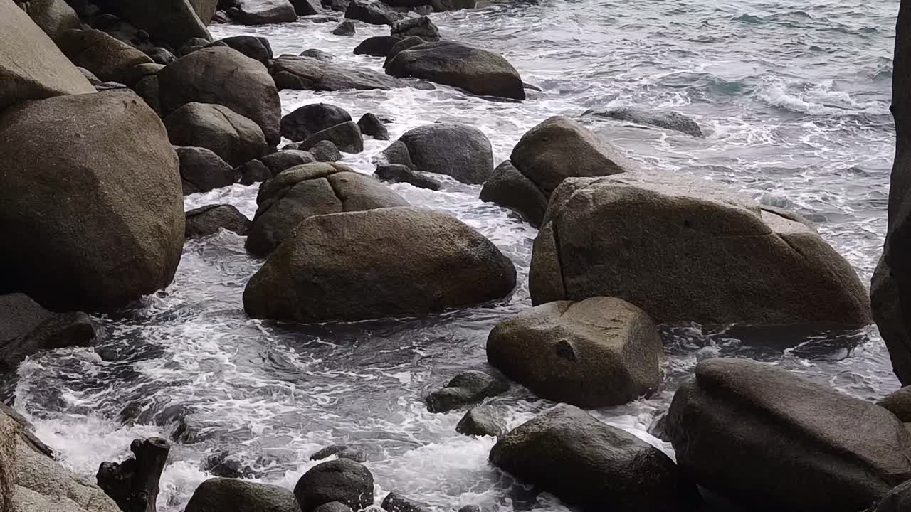 Waves Crashing on Coastal Rocks