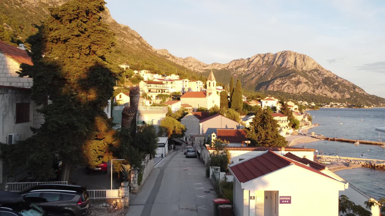 Fly Over The Road Of Brist Village At Sunset In Southern Dalmatia, Croatia. Aerial Drone Shot