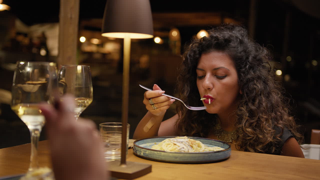 Friends Having An Elegant Dinner At The Resort During Summer