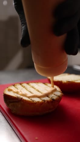 preparing a gourmet burger