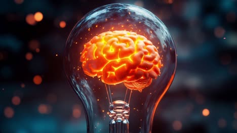 a light bulb with a glowing brain inside of it