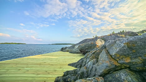 sliding timelapse of cirrus clouds moving over the sea in the latvian nature