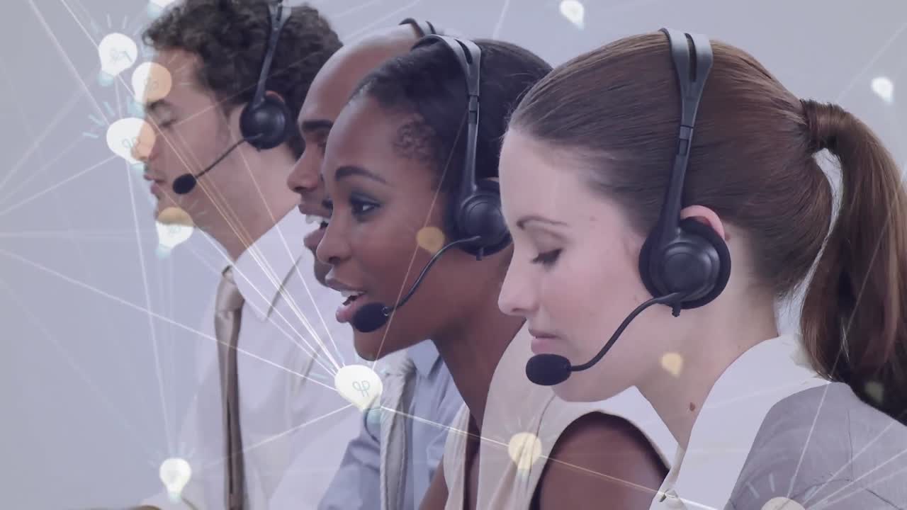 Animation of network of connection with icons over business people wearing phone headsets