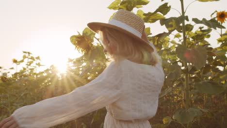pretty woman in field flirting with camera