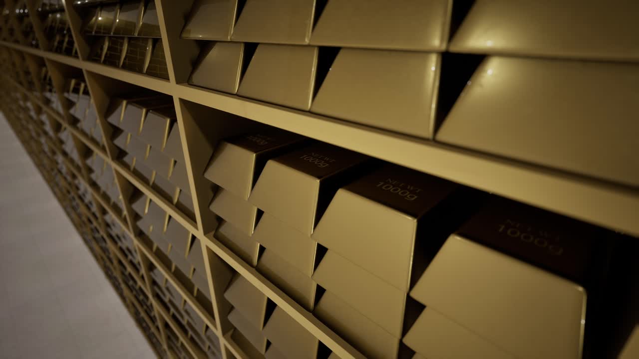 Closeup of Gold Bars Stacked in a Bank Vault Shelf