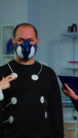man undergoing a medical respiratory or metabolic test with electrodes