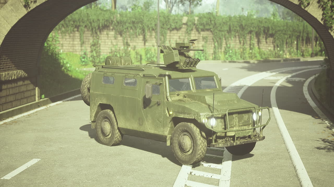Military vehicle navigating a winding road beneath a verdant archway