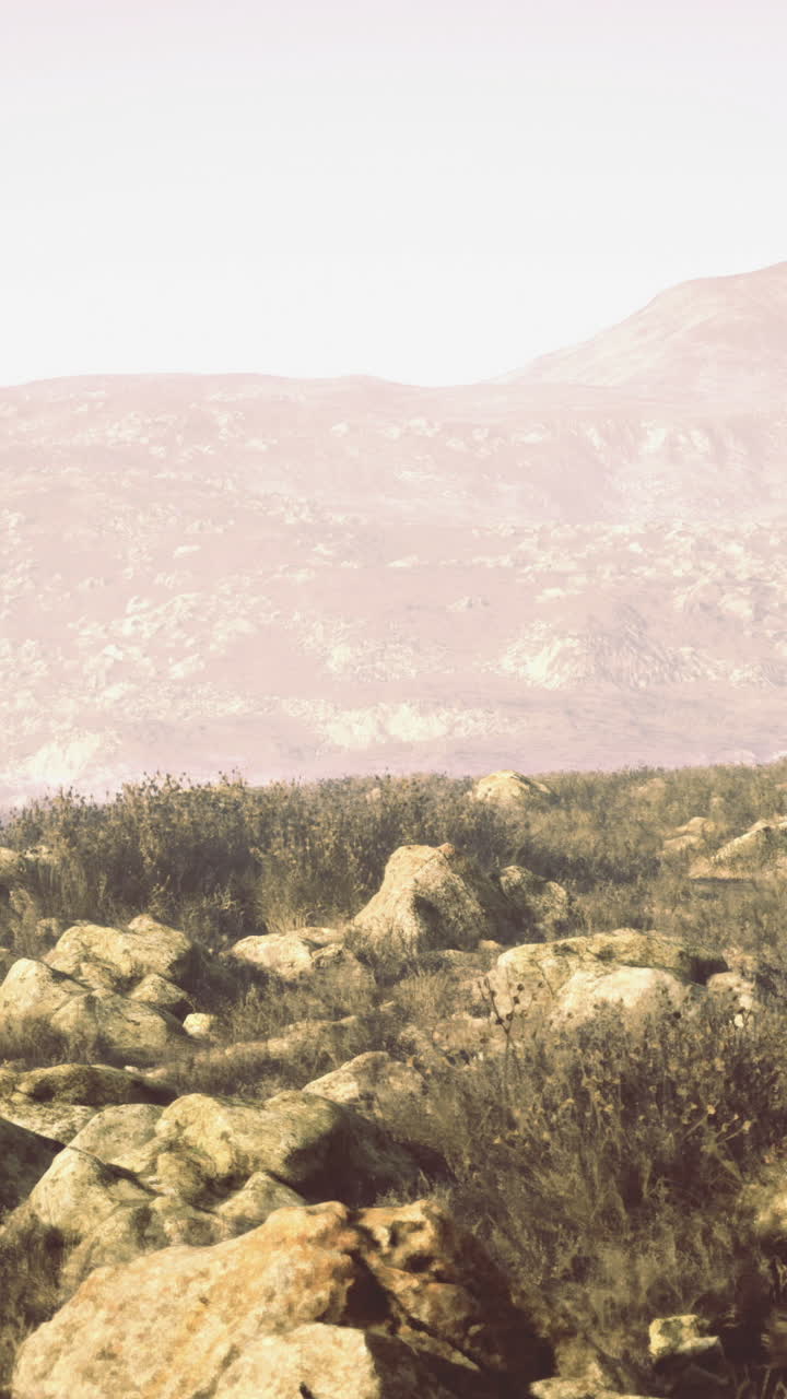 Scenic mountain landscape with rocky terrain during soft daylight hours