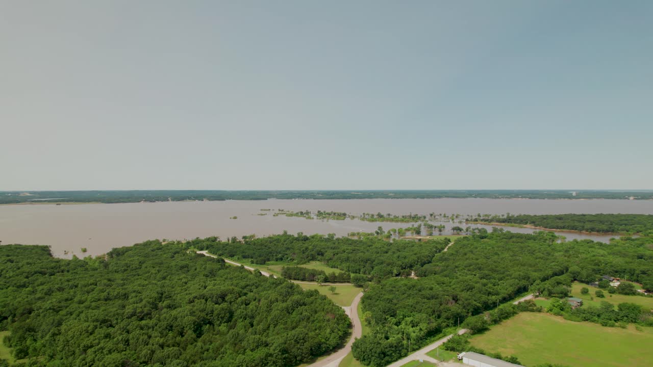 Aerial footage of Lake Texoma near the dam flooding. This video was shot on the northern part of the dam in Oklahoma. Severe flooding can be seen after several rain storms.