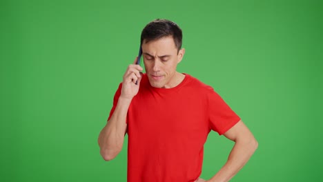 Man talking on the phone in a hurry