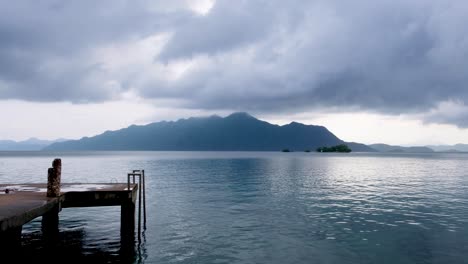 Time-lapse-of-storm-forming-with-grey-rolling-clouds-in-Coron-Bay-with-scenic-tropical-island-and-ocean-views-in-Palawan,-Philippines