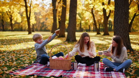 family picnic in autumn park