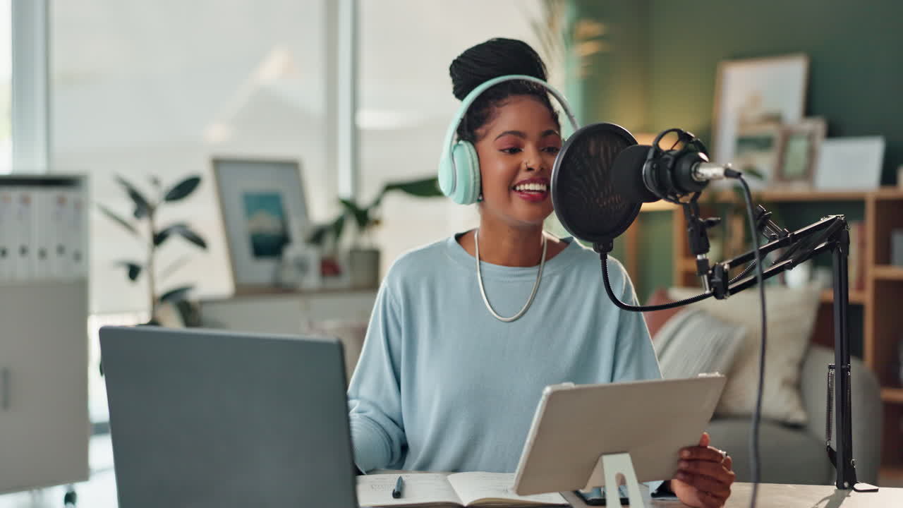 Woman recording a podcast with microphone and headphones