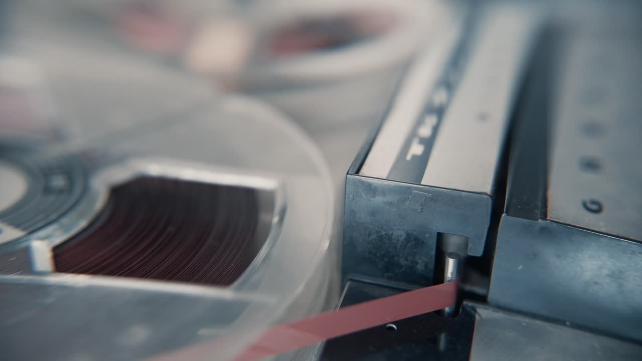 Close-up of Vintage Reel-to-Reel Tape Recorder Playing