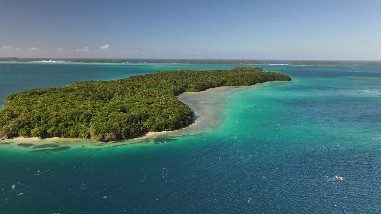 Lush Forest Surrounded By Blue Water In Tropical Island Group Of Vava'u In Tonga. aerial, approaching shot