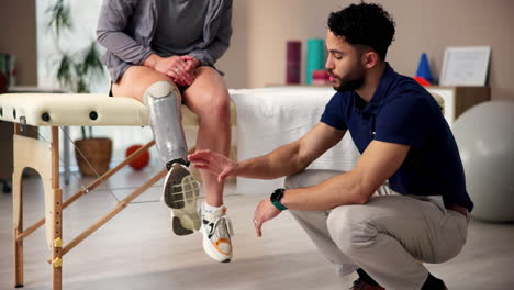 physical therapist examining a patient with a prosthetic leg