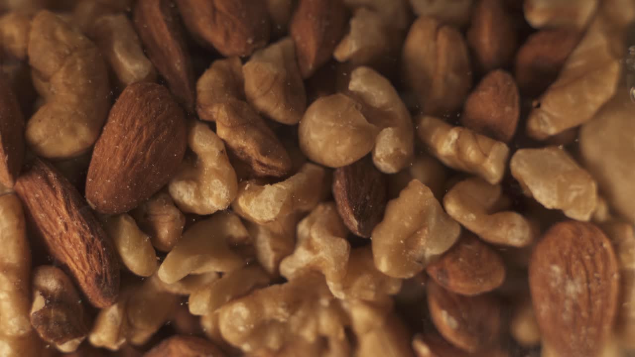 Close Up Of Trail Mix Nuts Rotating On Turntable Platform