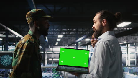 army engineering team in command center server hub using mockup laptop