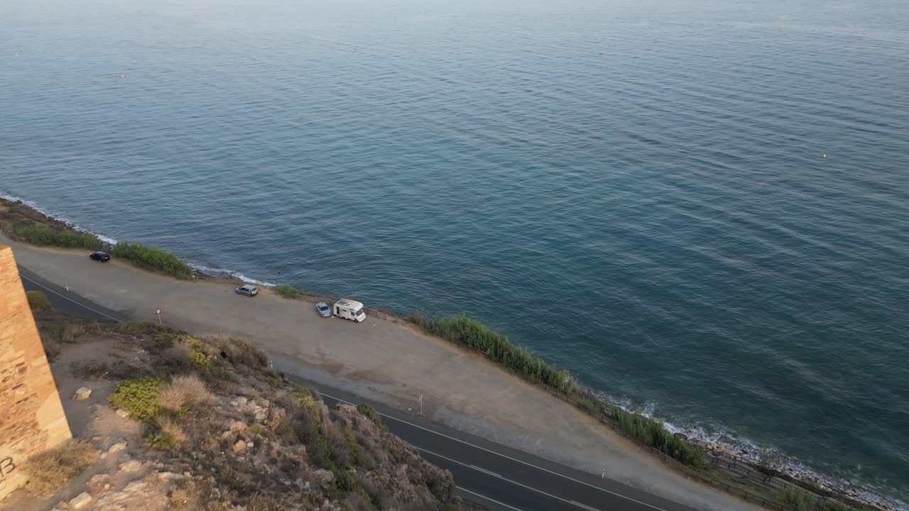 Experience the historic Tower of Jaral in Almayate Bajo from a mesmerizing drone's-eye view