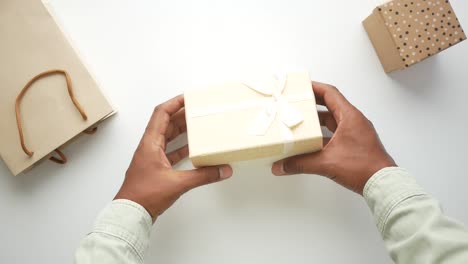 person holding a gift box