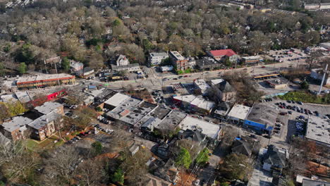 atlanta aerial v783 cinematic birds eye view flyover moreland avenue at little five points neighborhood, tilt up reveals downtown cityscape at daytime - shot with mavic 3 cine - december 2021