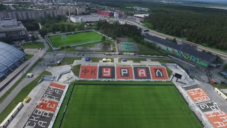 aerial view of a soccer stadium and sports complex