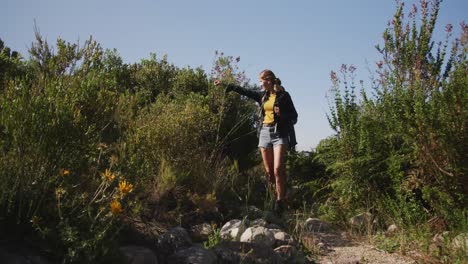 caucasian couple hiking in nature