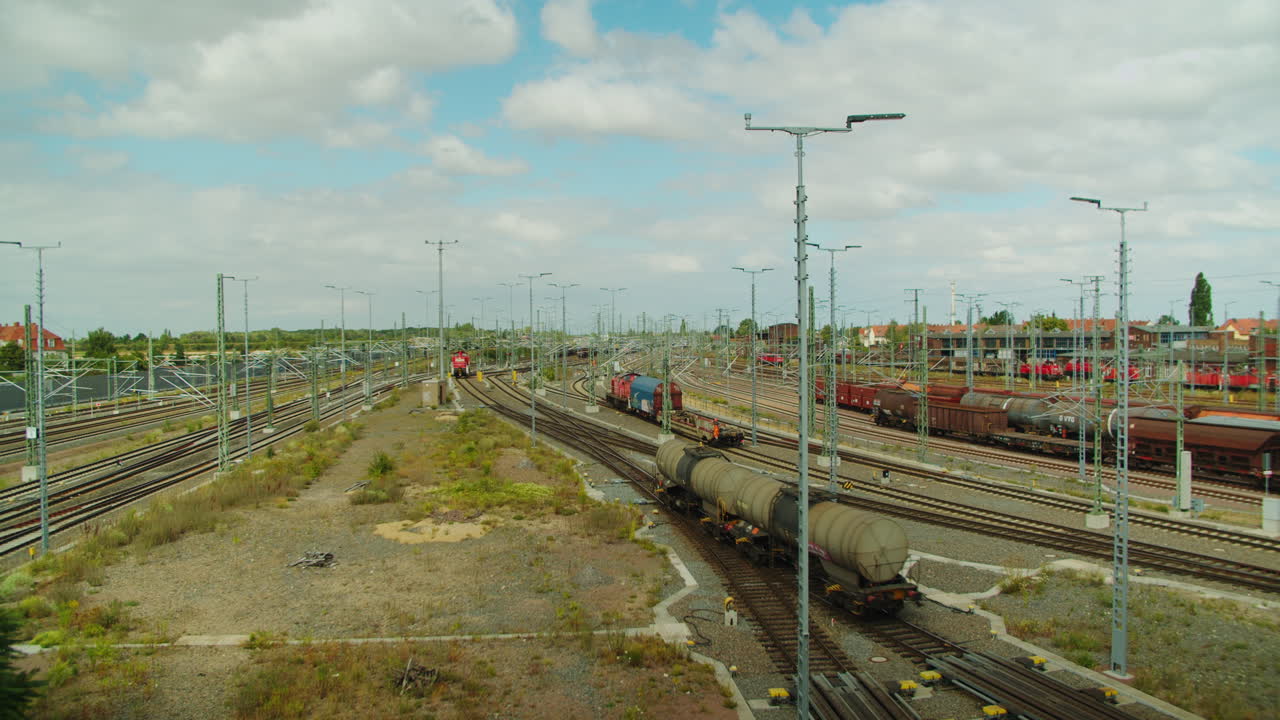 two tank cars rolling down a shunting hump