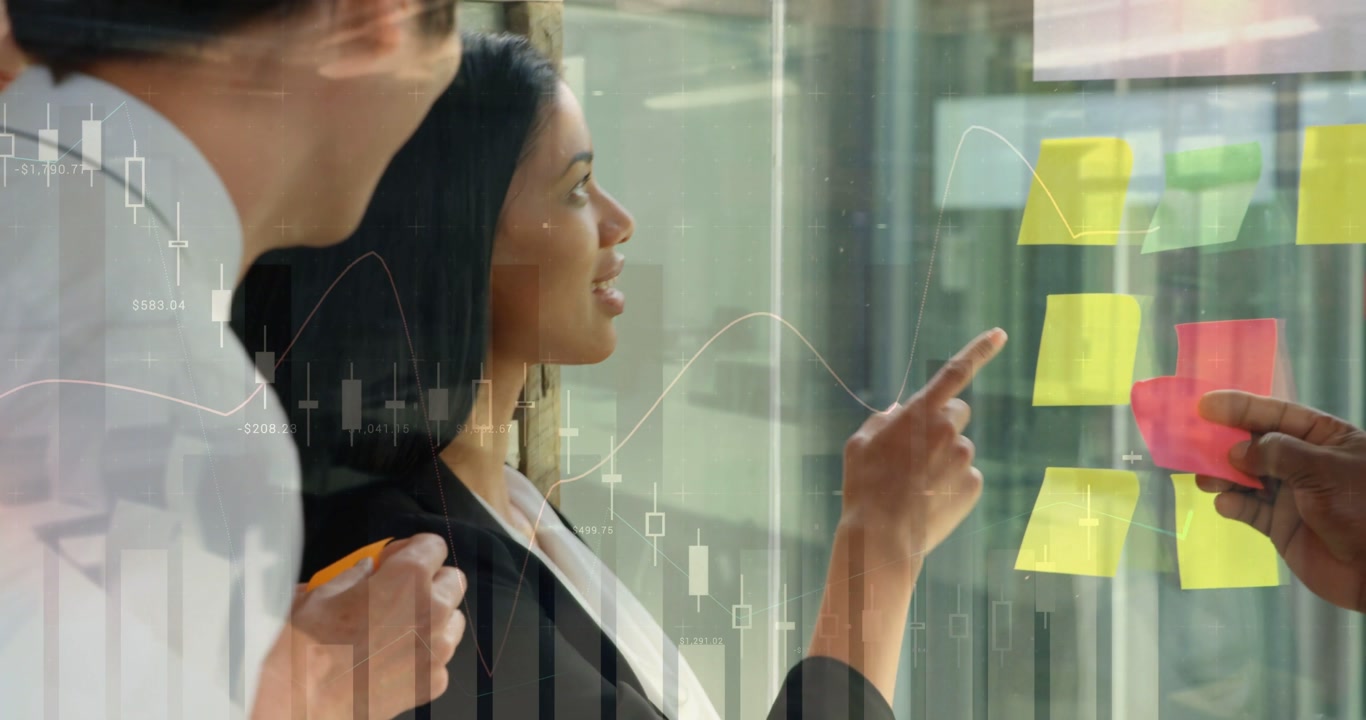 Woman leading finance team scanning glass panel notes after pink note offer, organizing with charts