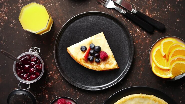 Tasety homemade pancake on black ceramic plate 