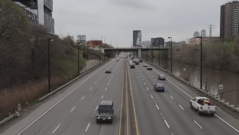 traffic trailing off into the distance on an overcast day