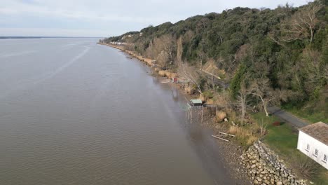 Fishing-Huts-on-Gironde-Estuary,-Bordeaux,-France---aerial