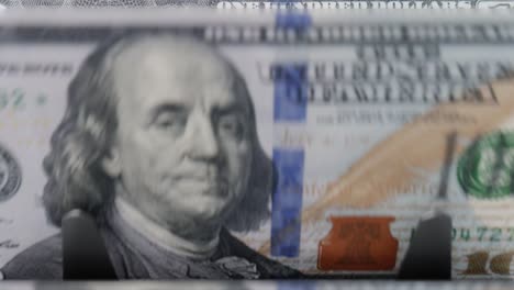 counting dollar banknotes close up in a money counting machine.