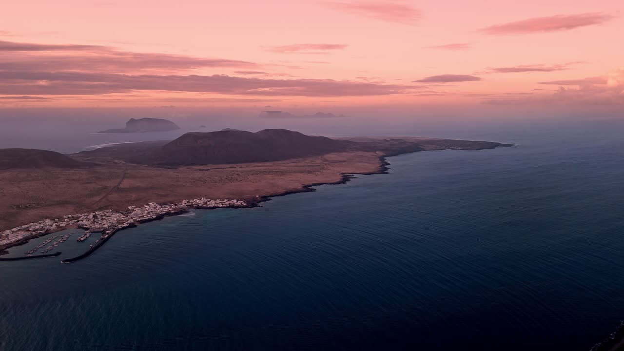 Breathtaking aerial drone footage captured at sunset from El Mirador del Río in Lanzarote, Canary Islands, Spain
